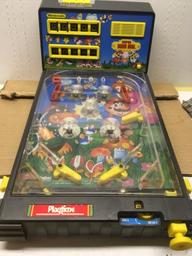 Very fun looking little pinball machine with a Super Mario theme on it